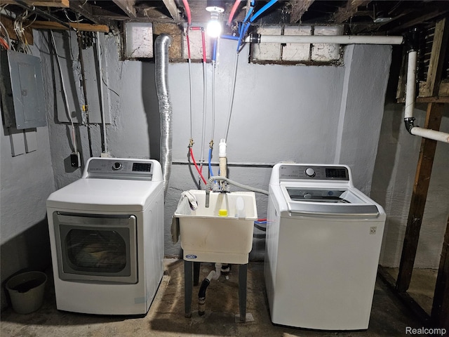 4294 W Buena Vista St, Detroit, MI 48238 - laundry room featuring washing machine and dryer and electric panel