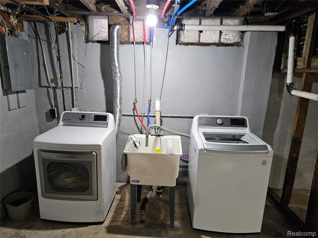 4294 W Buena Vista St, Detroit, MI 48238 - laundry room with washing machine and clothes dryer and electric panel