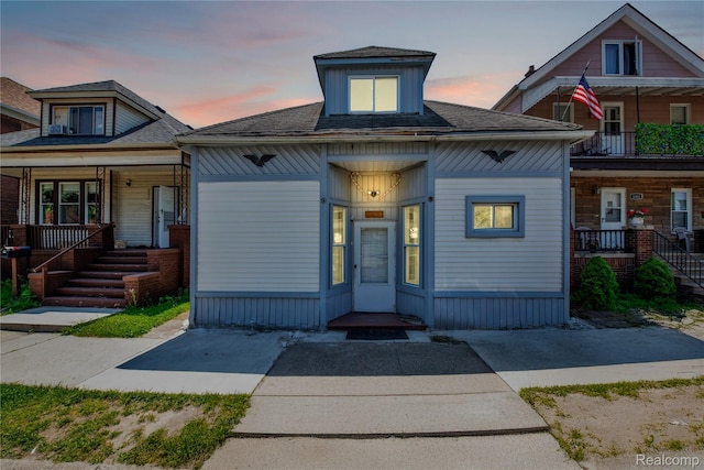 3368 Evaline St, Hamtramck, MI 48212 - bungalow-style house with a porch and roof with shingles