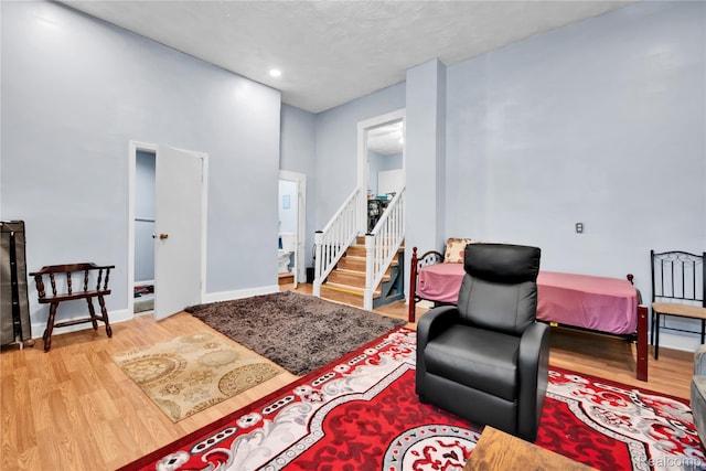 3368 Evaline St, Hamtramck, MI 48212 - living area with wood finished floors and stairs
