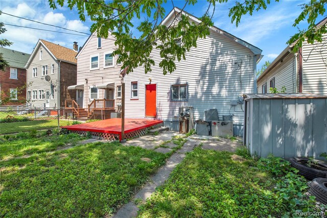3368 Evaline St, Hamtramck, MI 48212 - back of property with a deck and a shed