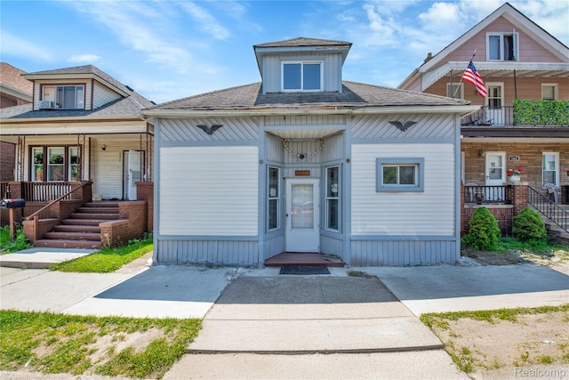 3368 Evaline St, Hamtramck, MI 48212 - view of front of property with a porch and a shingled roof