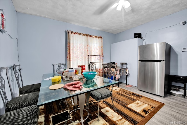3368 Evaline St, Hamtramck, MI 48212 - dining space featuring light wood-type flooring and ceiling fan