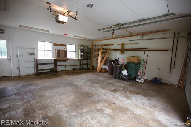 5820 Houghten Dr, Troy, MI 48098 - garage featuring a garage door opener