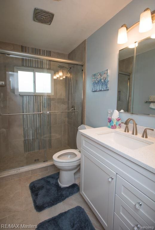 5820 Houghten Dr, Troy, MI 48098 - full bath featuring vanity, tile patterned floors, and a shower stall