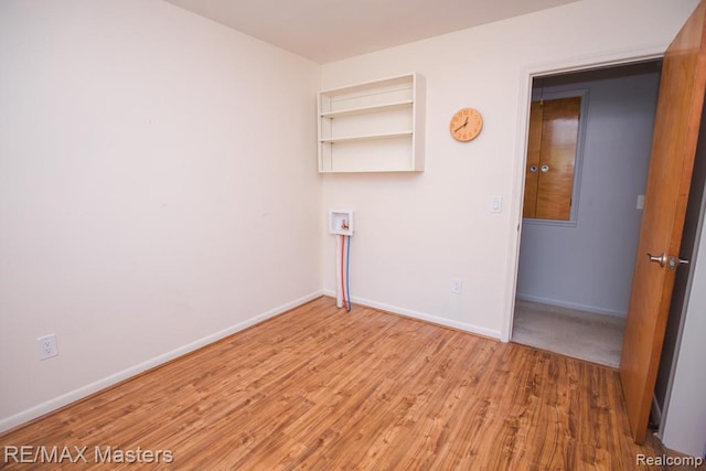 5820 Houghten Dr, Troy, MI 48098 - spare room featuring wood finished floors and baseboards