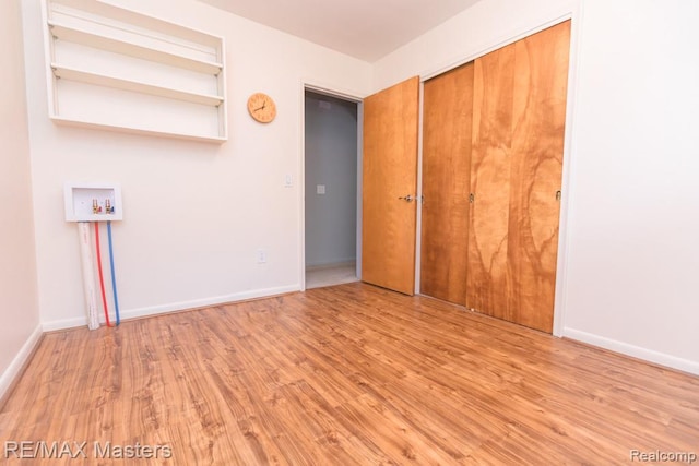 5820 Houghten Dr, Troy, MI 48098 - spare room featuring wood finished floors and baseboards
