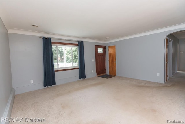 5820 Houghten Dr, Troy, MI 48098 - carpeted empty room with arched walkways and ornamental molding