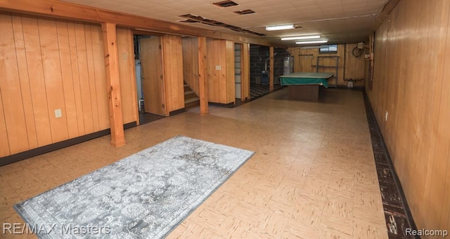 5820 Houghten Dr, Troy, MI 48098 - finished basement with wood walls, stairway, pool table, and a drop ceiling