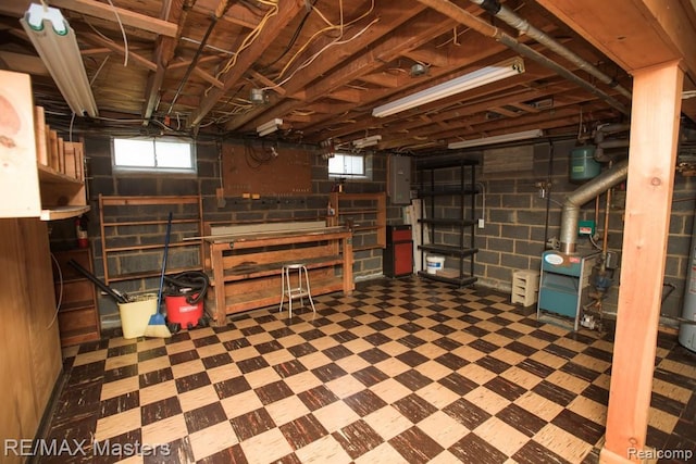 5820 Houghten Dr, Troy, MI 48098 - basement featuring tile patterned floors and a heating unit
