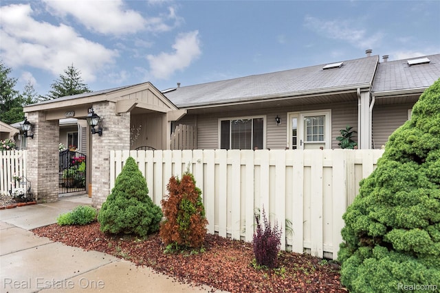 62622 Raleigh Ct Unit 4, South Lyon, MI 48178 - view of front of property featuring brick siding