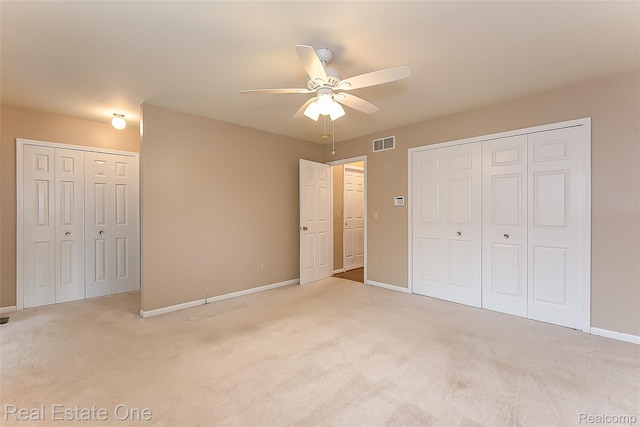 62622 Raleigh Ct Unit 4, South Lyon, MI 48178 - unfurnished bedroom featuring carpet flooring and a ceiling fan