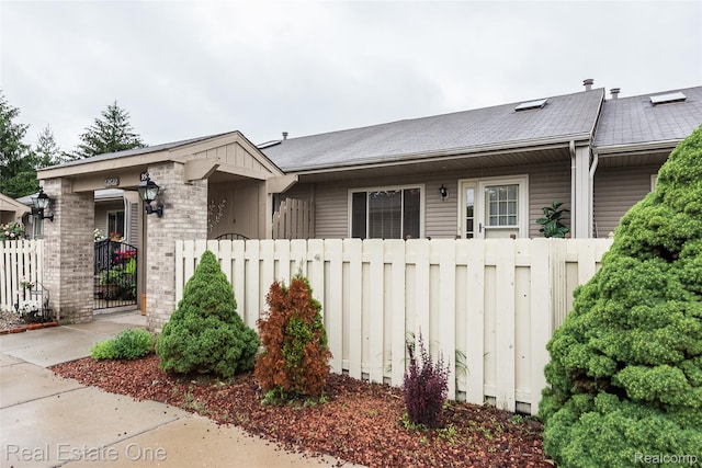 62622 Raleigh Ct Unit 4, South Lyon, MI 48178 - view of front of house featuring brick siding