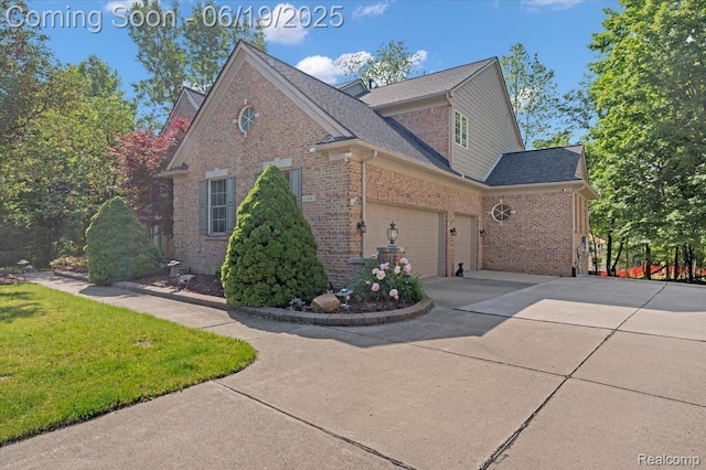 43443 Mclean Ct, Novi, MI 48375 - view of home's exterior with brick siding, concrete driveway, a garage, a lawn, and roof with shingles