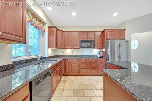 43443 Mclean Ct, Novi, MI 48375 - kitchen featuring black appliances, dark stone counters, stone tile floors, recessed lighting, and brown cabinets