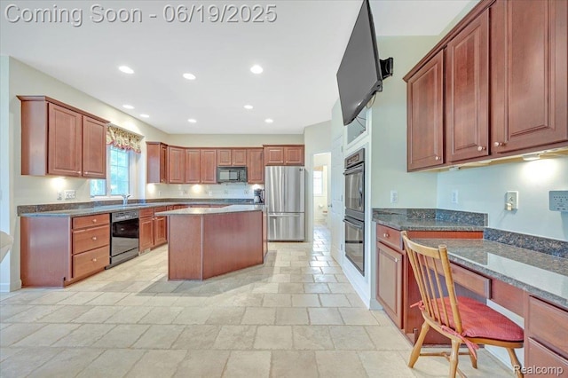 43443 Mclean Ct, Novi, MI 48375 - kitchen featuring appliances with stainless steel finishes, a kitchen island, light stone finish floors, dark stone counters, and recessed lighting