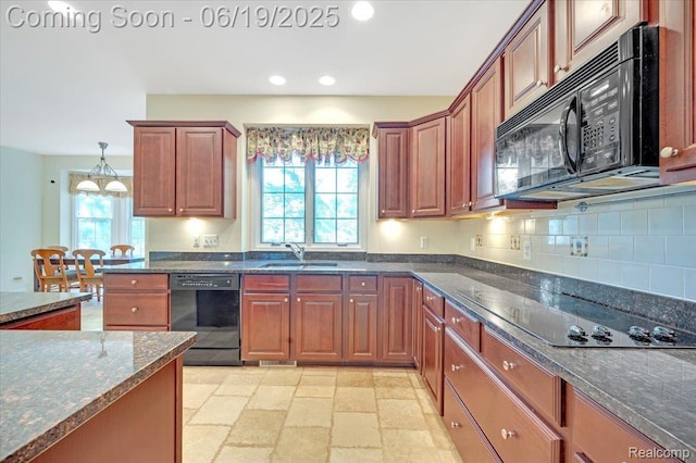 43443 Mclean Ct, Novi, MI 48375 - kitchen with black appliances, stone tile floors, dark stone counters, decorative backsplash, and recessed lighting