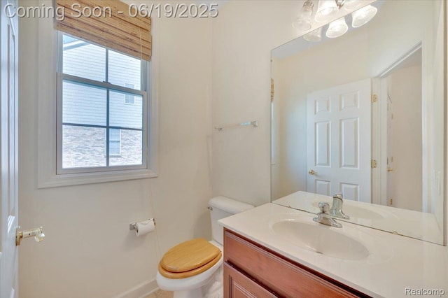 43443 Mclean Ct, Novi, MI 48375 - bathroom with plenty of natural light, vanity, and a chandelier