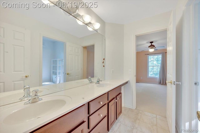 43443 Mclean Ct, Novi, MI 48375 - full bathroom with double vanity and baseboards