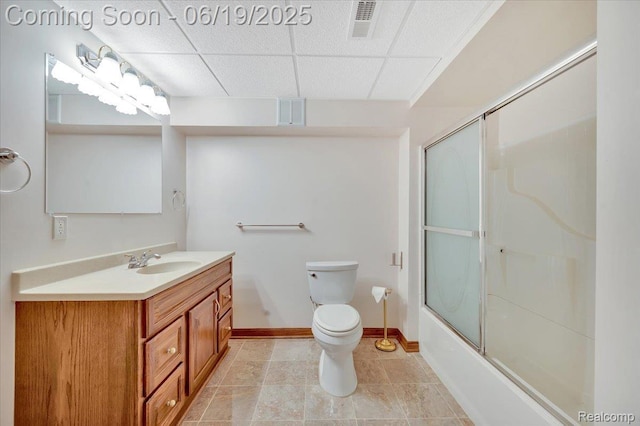 43443 Mclean Ct, Novi, MI 48375 - bathroom with a drop ceiling, vanity, and combined bath / shower with glass door