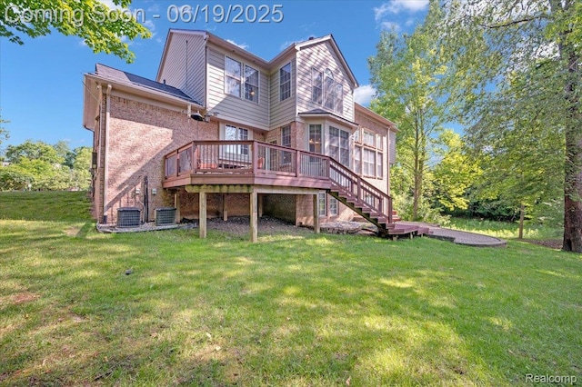 43443 Mclean Ct, Novi, MI 48375 - back of house featuring a wooden deck, a yard, brick siding, and stairway