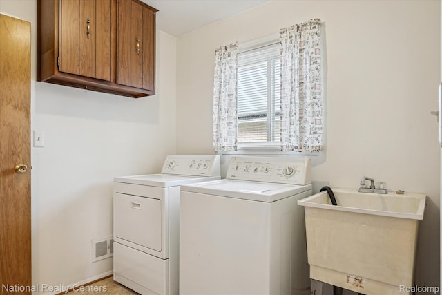 13142 Boca Grande Dr, Sterling Heights, MI 48312 - laundry area with separate washer and dryer and cabinet space