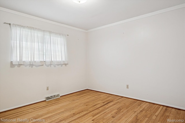 13142 Boca Grande Dr, Sterling Heights, MI 48312 - empty room featuring wood finished floors and crown molding