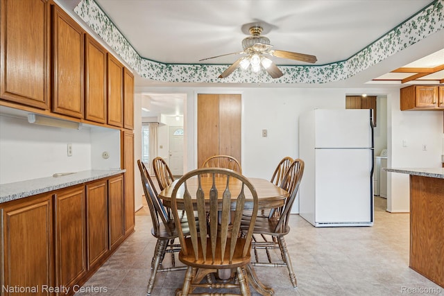 13142 Boca Grande Dr, Sterling Heights, MI 48312 - dining space featuring ceiling fan and washer / clothes dryer