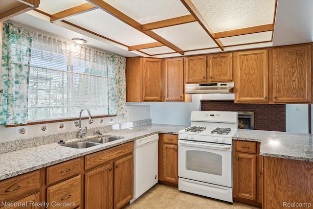 13142 Boca Grande Dr, Sterling Heights, MI 48312 - kitchen with white appliances, under cabinet range hood, brown cabinetry, and healthy amount of natural light