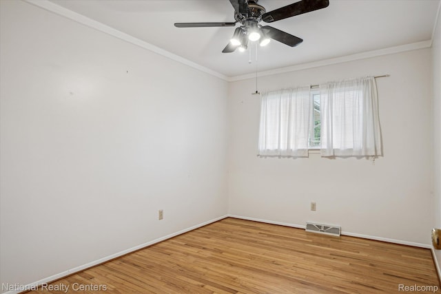 13142 Boca Grande Dr, Sterling Heights, MI 48312 - spare room with crown molding, ceiling fan, and light wood-type flooring