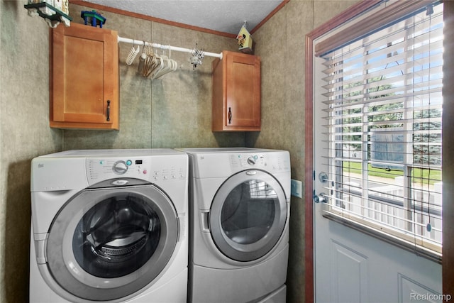 501 Kinloch, Temperance, MI 48182 - laundry area with cabinet space, washer and dryer, a textured ceiling, and ornamental molding