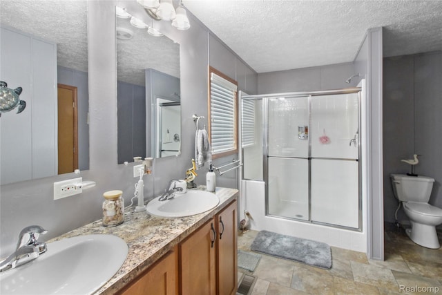 501 Kinloch, Temperance, MI 48182 - full bathroom with a shower stall, a textured ceiling, and double vanity