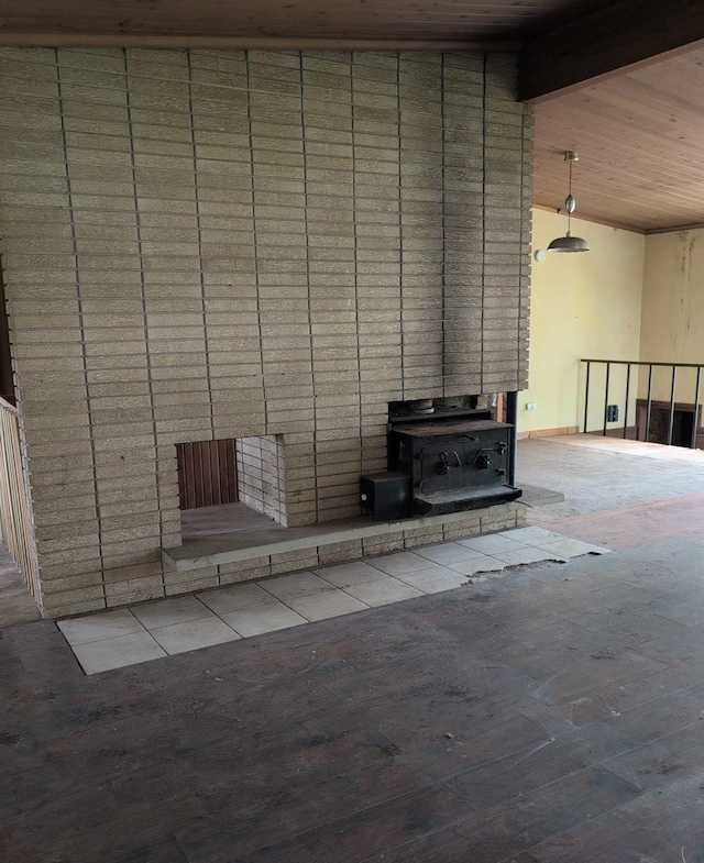 13235 Waterstradt Rd, Marcellus, MI 49067 - unfurnished living room featuring a wood stove, high vaulted ceiling, a wooden ceiling with exposed beams, and wood finished floors