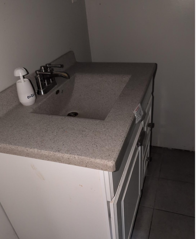 13235 Waterstradt Rd, Marcellus, MI 49067 - bathroom with vanity and tile patterned flooring