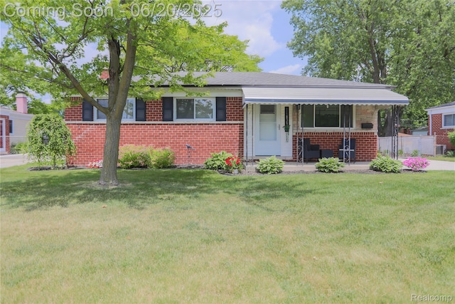 14839 Chippewa Dr, Warren, MI 48088 - bungalow featuring brick siding, a front yard, and a porch