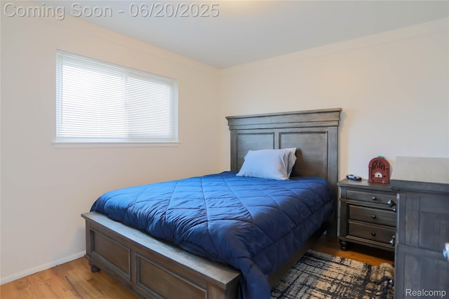 14839 Chippewa Dr, Warren, MI 48088 - bedroom featuring wood finished floors and baseboards