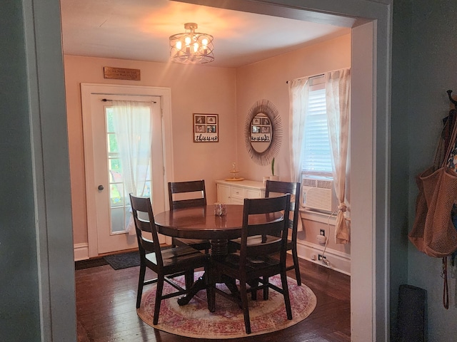 1908 Lakeway Ave, Kalamazoo, MI 49001 - dining area with dark wood-style floors, plenty of natural light, a chandelier, and cooling unit