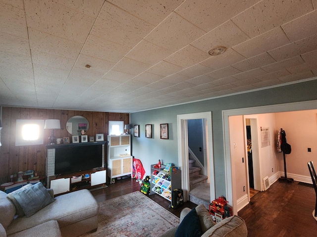 1908 Lakeway Ave, Kalamazoo, MI 49001 - living area featuring wood walls, wood finished floors, plenty of natural light, and stairs