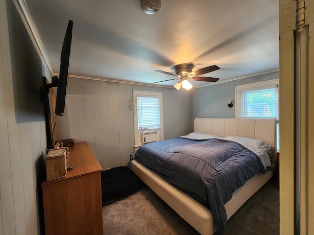 1908 Lakeway Ave, Kalamazoo, MI 49001 - bedroom with multiple windows, carpet flooring, a ceiling fan, cooling unit, and wood walls