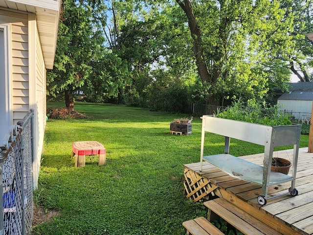 1908 Lakeway Ave, Kalamazoo, MI 49001 - view of yard with a deck and a fire pit