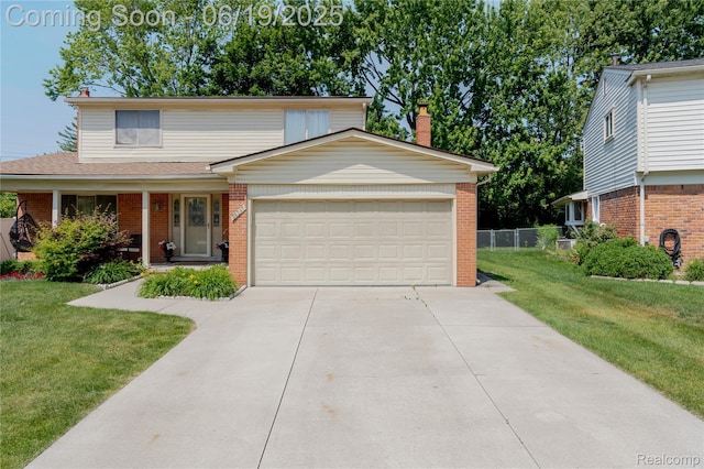38247 Forsdale Dr, Sterling Heights, MI 48310 - traditional home with brick siding, a chimney, an attached garage, concrete driveway, and covered porch
