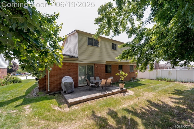38247 Forsdale Dr, Sterling Heights, MI 48310 - rear view of property featuring brick siding and a patio