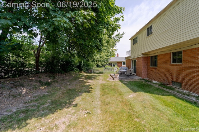 38247 Forsdale Dr, Sterling Heights, MI 48310 - view of green lawn with a patio area