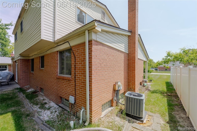 38247 Forsdale Dr, Sterling Heights, MI 48310 - view of side of property with brick siding and a chimney