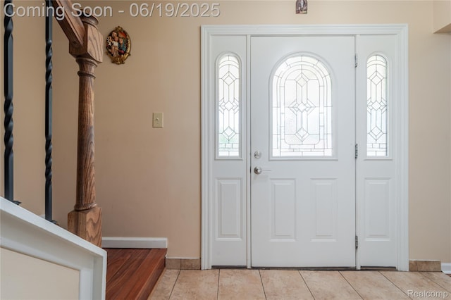 38247 Forsdale Dr, Sterling Heights, MI 48310 - foyer with baseboards and light tile patterned flooring