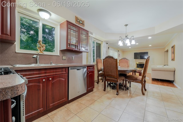 38247 Forsdale Dr, Sterling Heights, MI 48310 - kitchen with dishwasher, a chandelier, hanging light fixtures, reddish brown cabinets, and glass insert cabinets