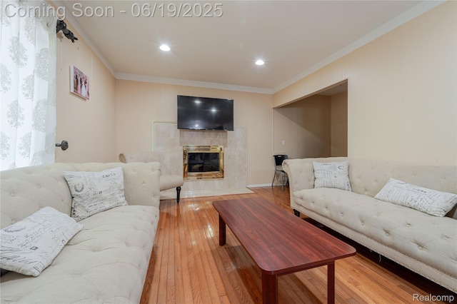38247 Forsdale Dr, Sterling Heights, MI 48310 - living room featuring ornamental molding, wood-type flooring, a fireplace, and recessed lighting