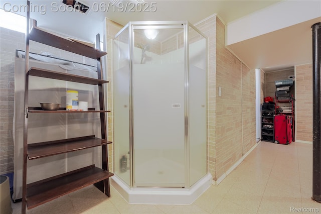 38247 Forsdale Dr, Sterling Heights, MI 48310 - full bath with a stall shower, tile patterned floors, and a walk in closet