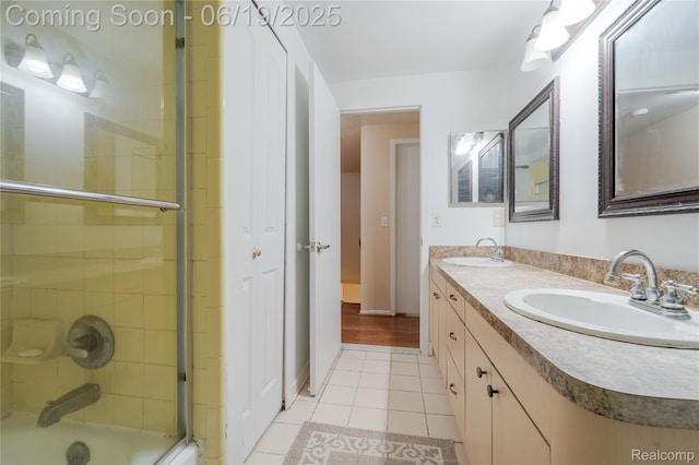 38247 Forsdale Dr, Sterling Heights, MI 48310 - bathroom with tile patterned flooring, double vanity, and combined bath / shower with glass door
