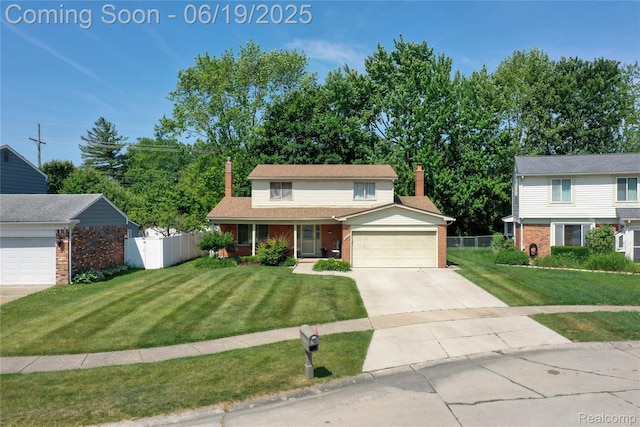 38247 Forsdale Dr, Sterling Heights, MI 48310 - traditional-style home with a chimney, concrete driveway, brick siding, and an attached garage